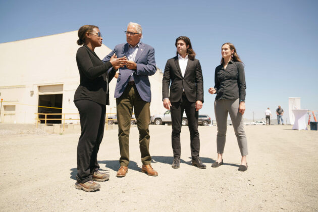 Gov. Jay Inslee (second from left) speaks at the Twelve groundbreaking in Moses Lake, Wash., with company co-founders, from left to right: Etosha Cave, chief science officer; Nicholas Flanders, CEO; and Kendra Kuhl, chief technology officer. (Twelve Photo)